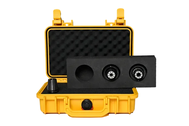 Open yellow case with parts in foam sitting on top of the case.